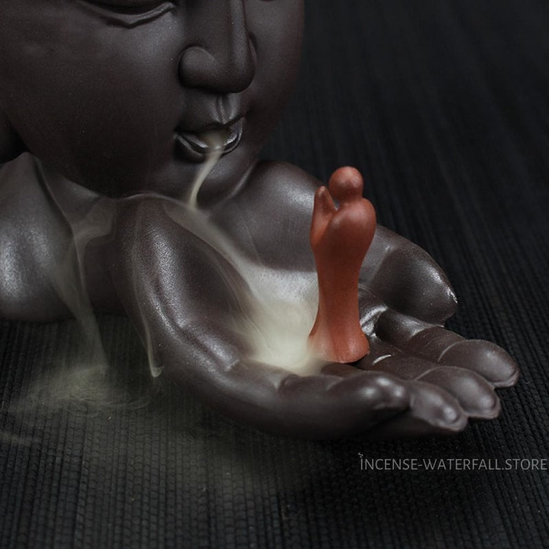 Buddha incense burner waterfall